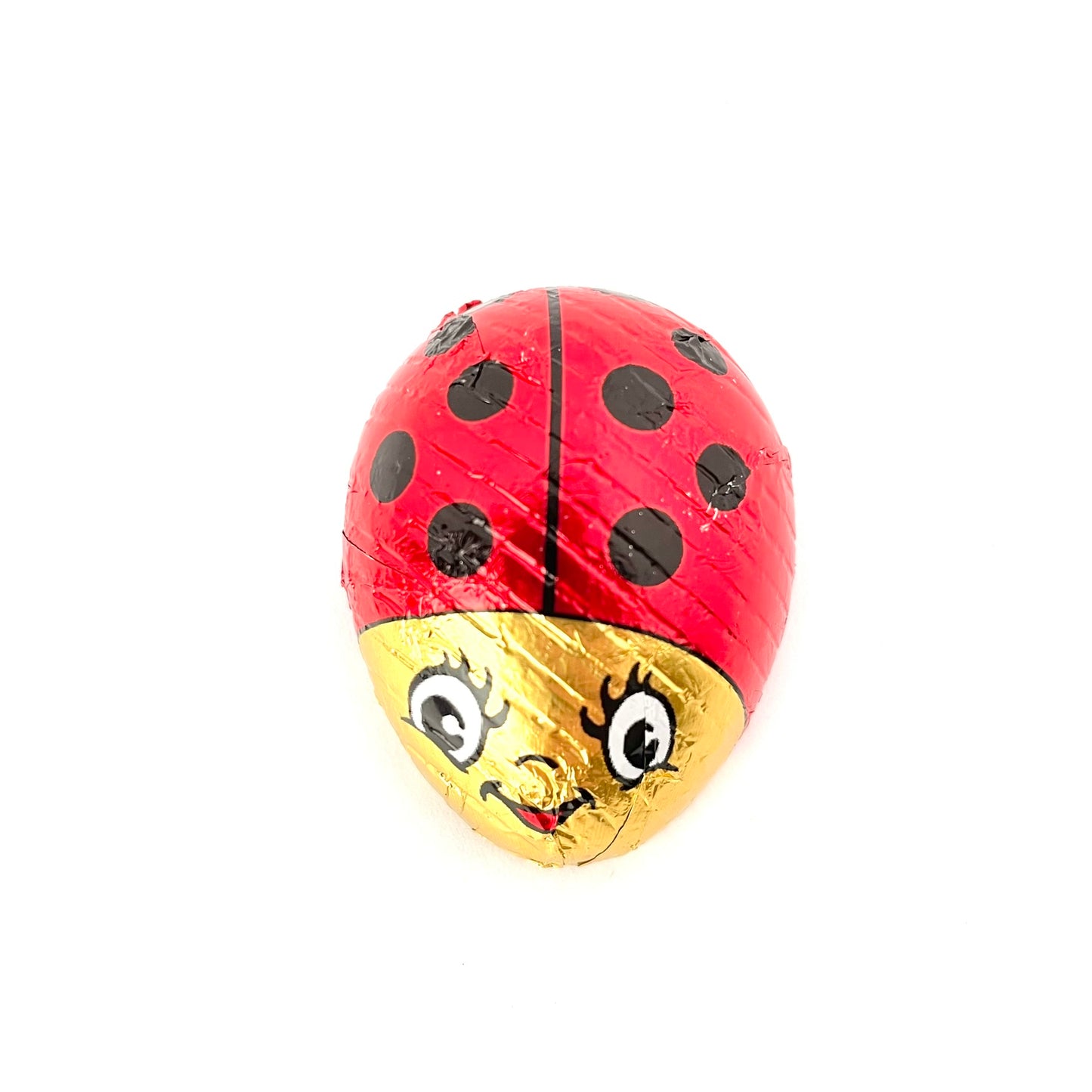 Coccinelles de chocolat au lait emballé de papier aluminium