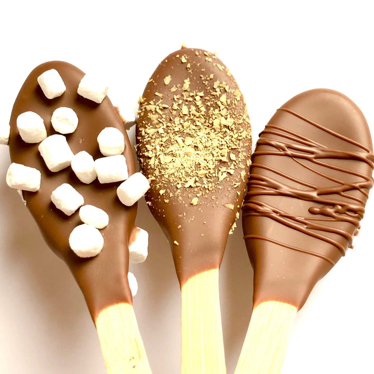 Milk chocolate covered spoons - Assorted flavours